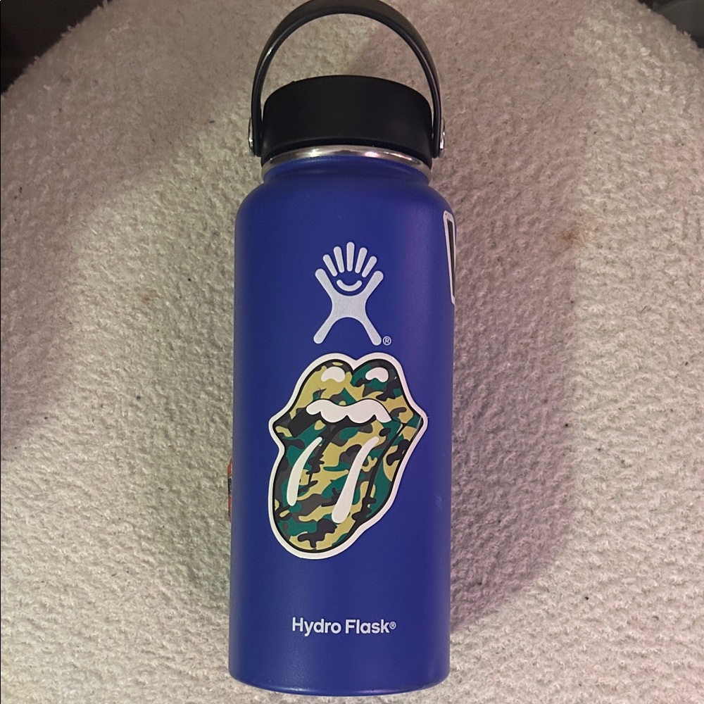 Hydro Flask Blue Water Bottle with Camo Sticker